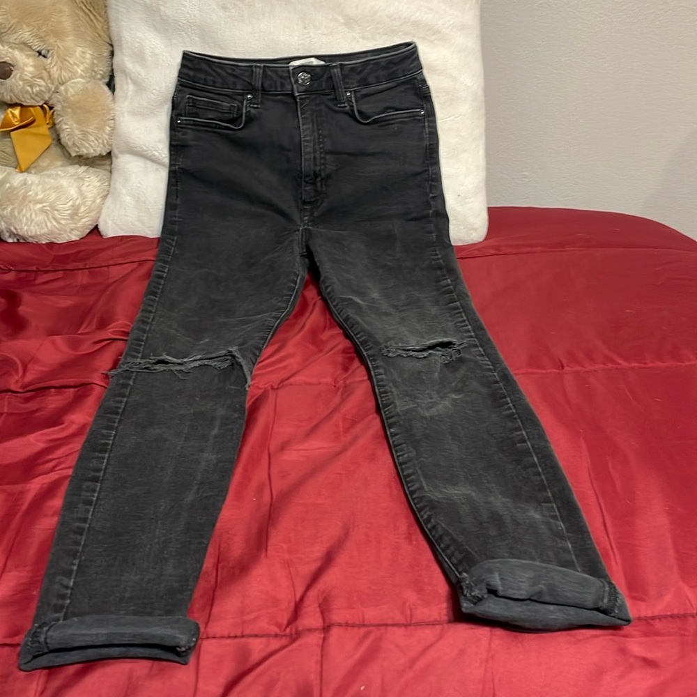 I am selling these high waisted skinny jeans that are grey washed type of color